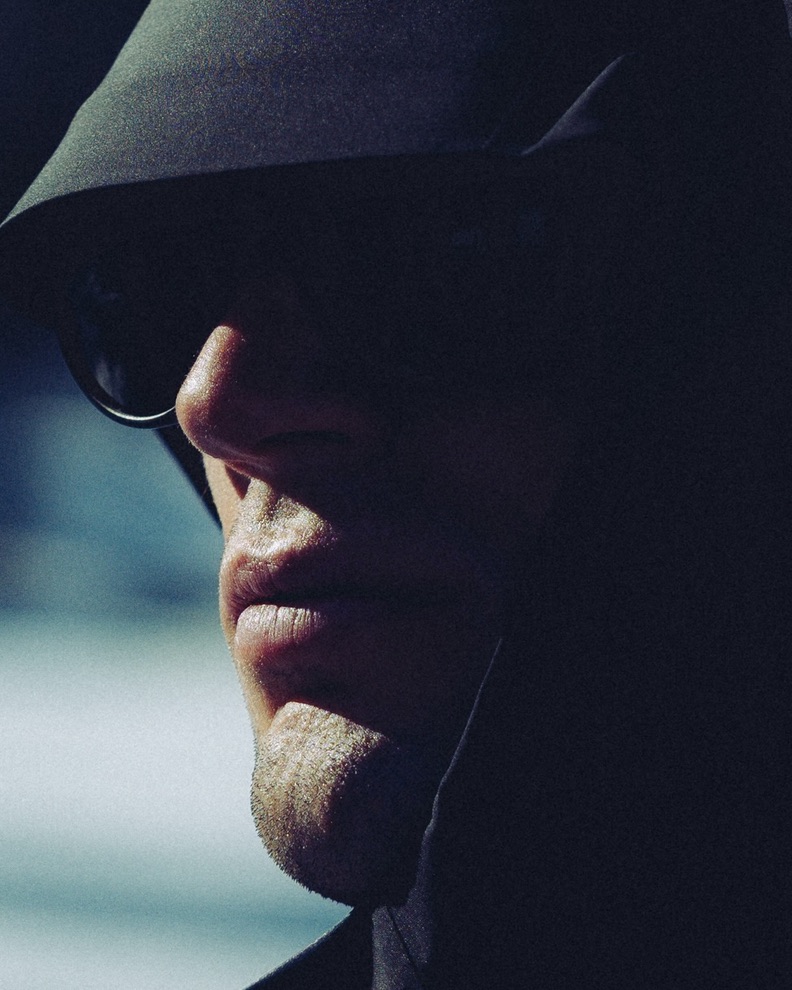 Close portrait of a skier in dark goggles for the Arc’teryx ABA Hero stills campaign
